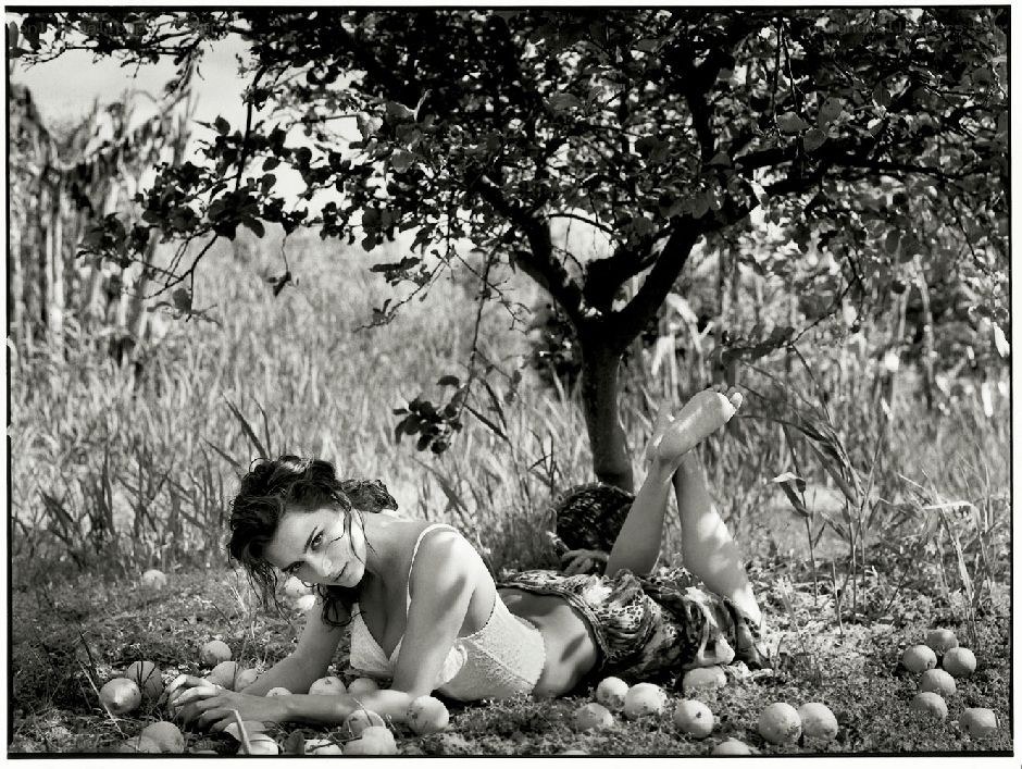 Woman resting under a tree