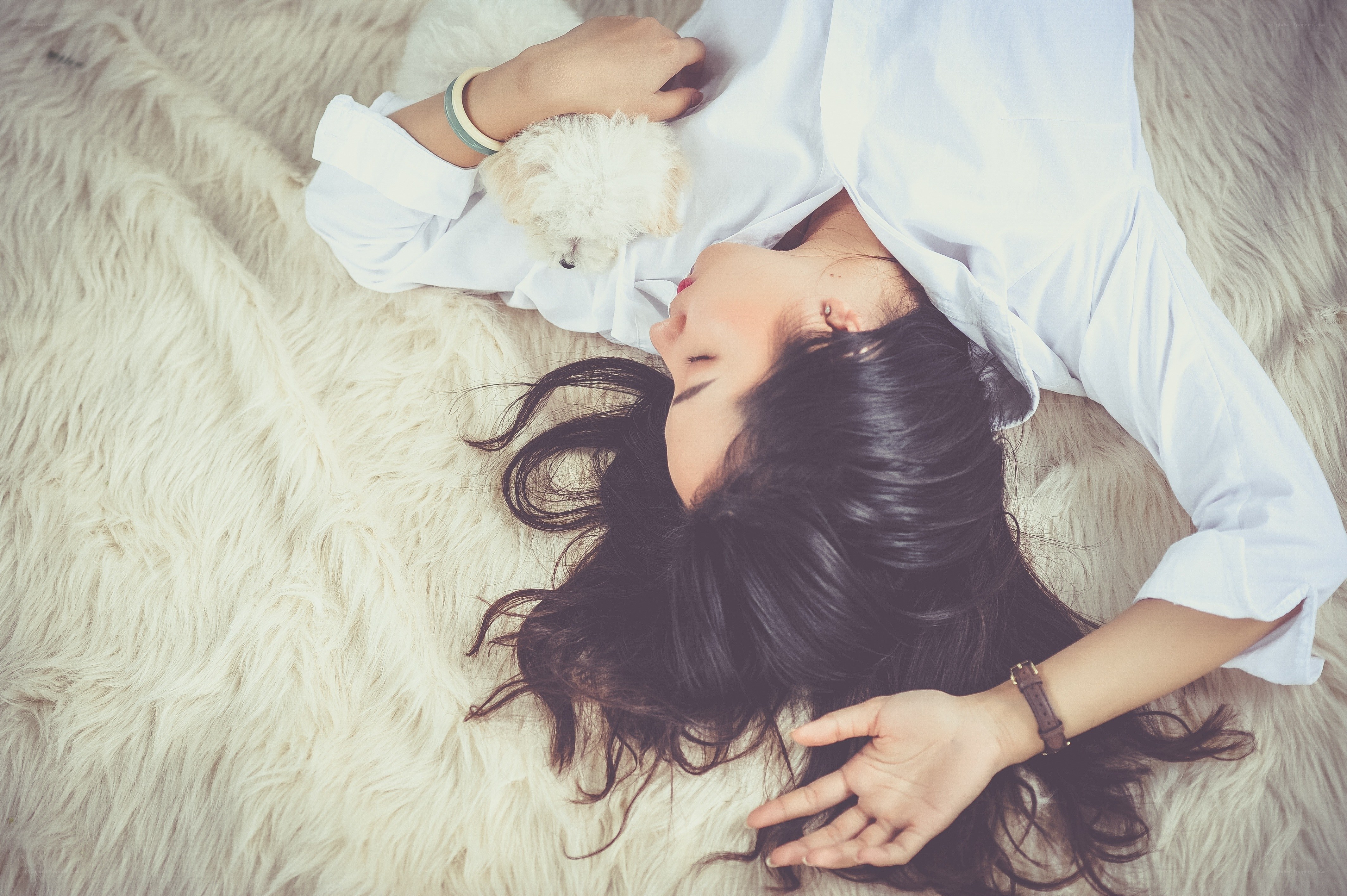 woman resting with dog