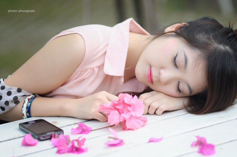 woman resting with flowers