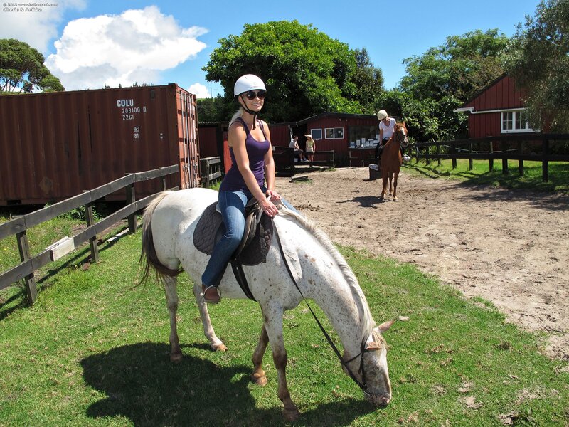 Woman riding a horse