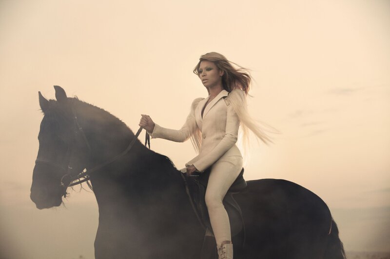 woman riding a horse