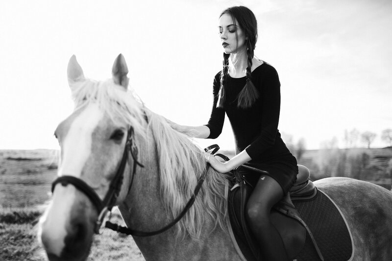 Woman Riding a Horse — Black, Dramatic, Afternoon