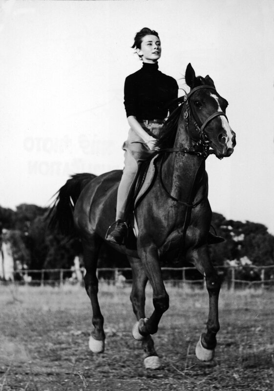 woman riding a horse