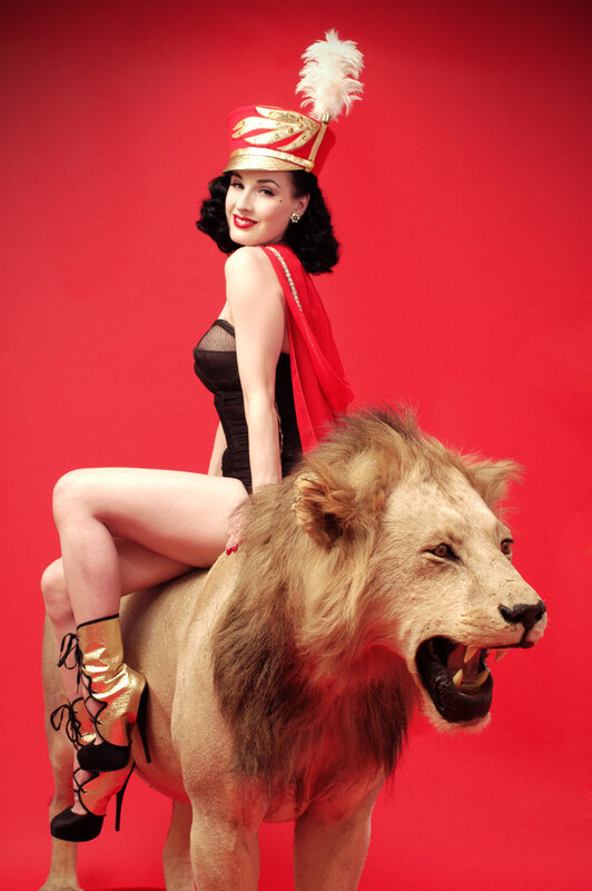 woman riding a lion