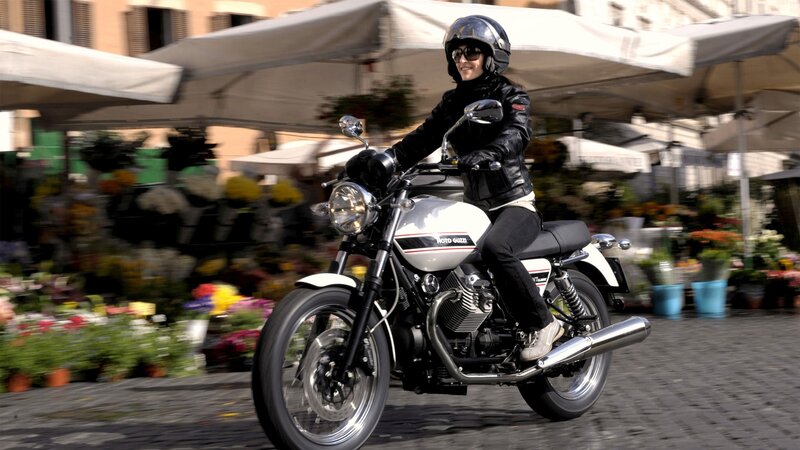 woman riding a motorcycle
