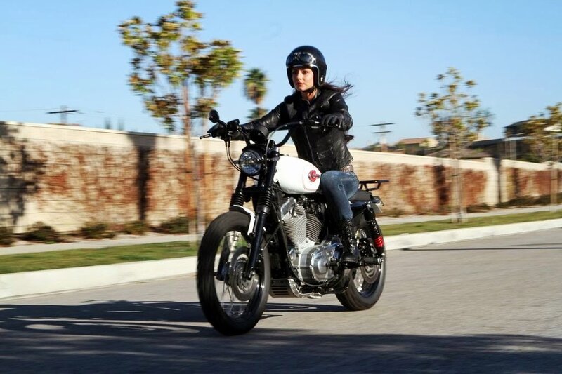 woman riding a motorcycle