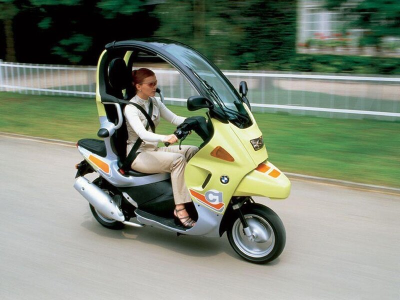woman riding a scooter