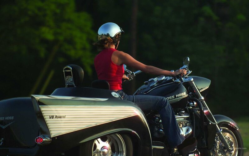 woman riding a trike motorcycle