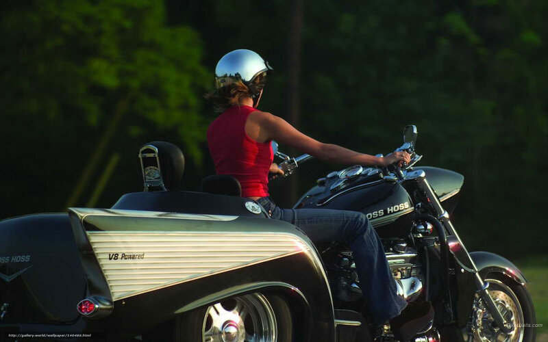woman riding a trike motorcycle