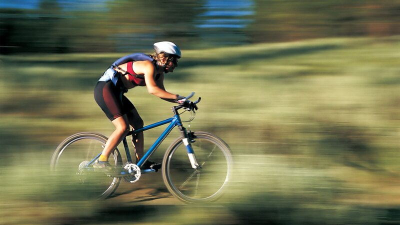 Woman Riding Bicycle — Blue, Active