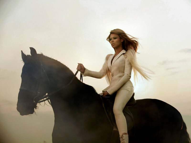Woman Riding Black Horse — White
