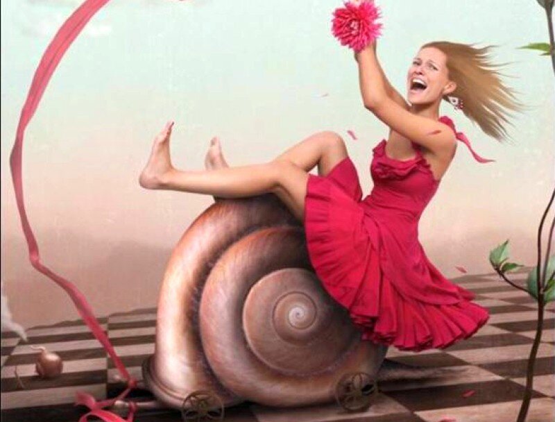 woman riding giant snail