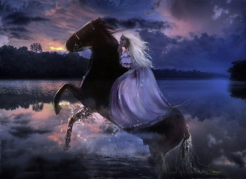 woman riding horse at dusk