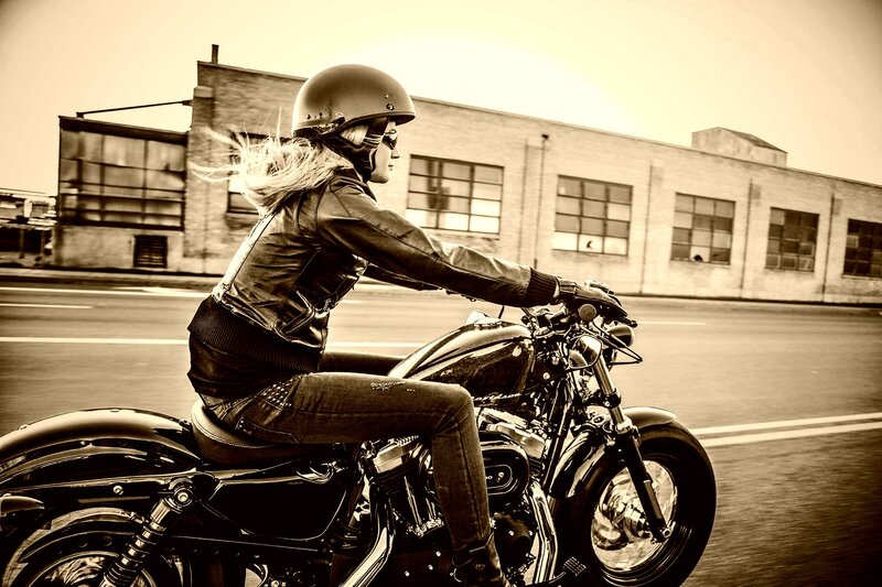 Woman Riding Motorcycle — Black, Dynamic, Afternoon, Photograph, Building