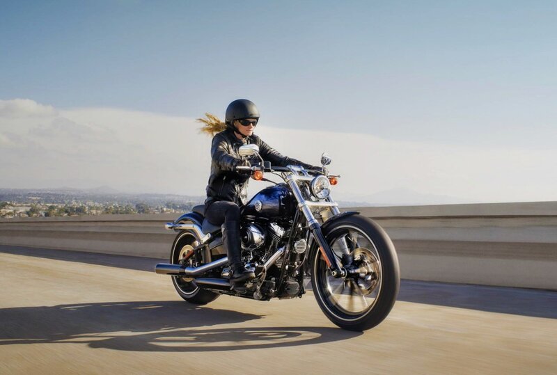 Woman Riding Motorcycle — Blue, Serene