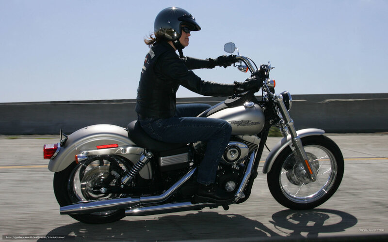 Woman Riding Motorcycle — Silver, Active