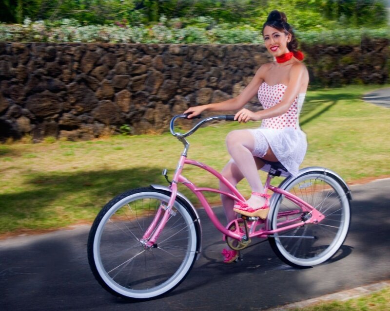 Woman Riding Pink Bicycle