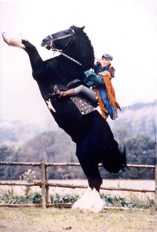 woman riding rearing horse