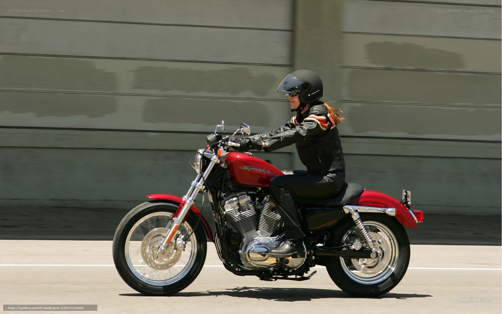 woman riding red motorcycle