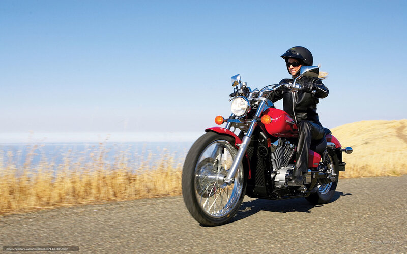 Woman Riding Red Motorcycle — Open