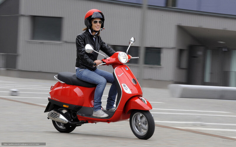 Woman Riding Red Scooter — Active