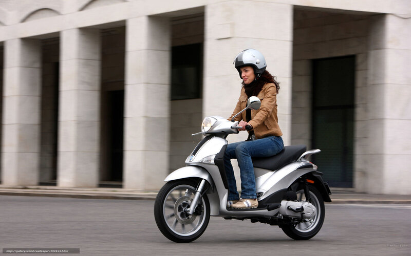 Woman Riding Scooter — Silver