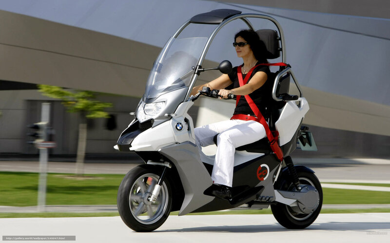 Woman Riding Scooter