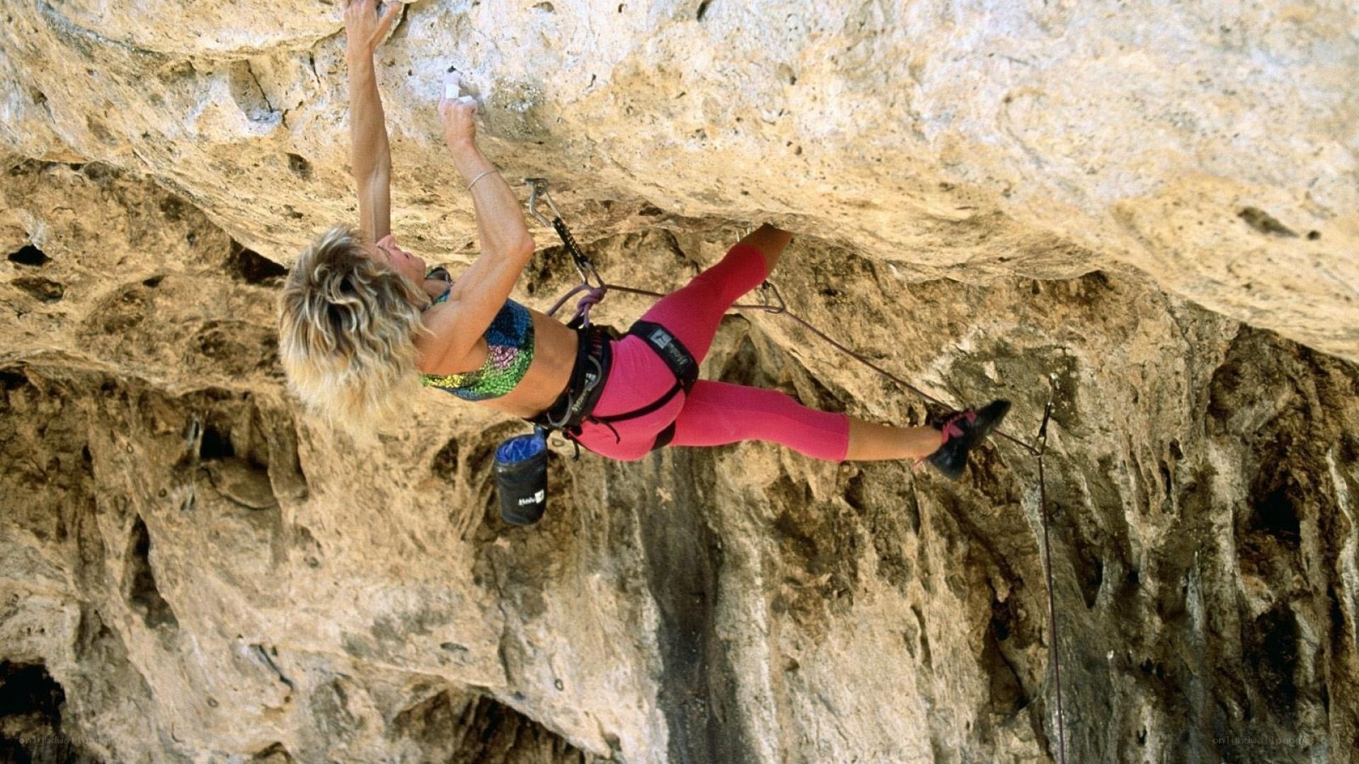 woman rock climbing
