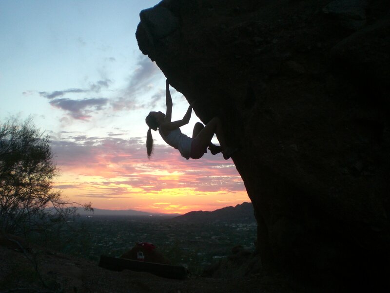 Woman Rock Climbing — Orange