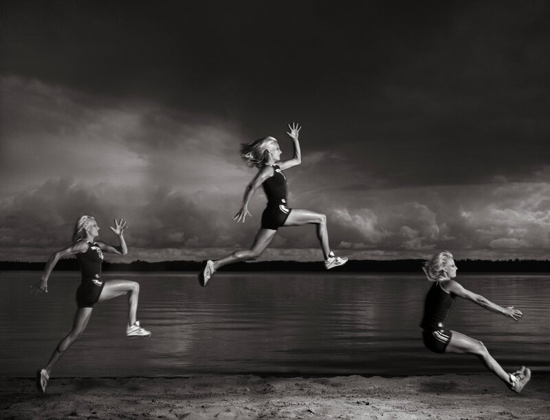 woman running by lake
