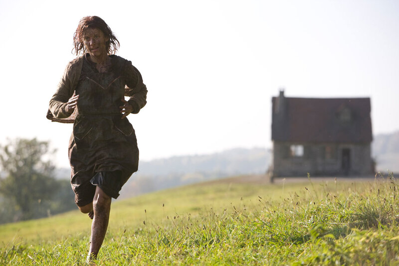 woman running in a field