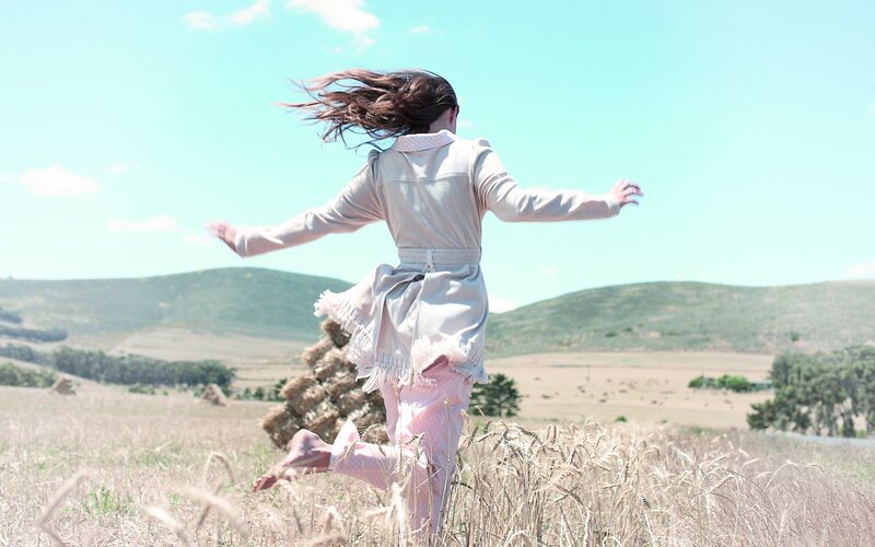 woman running in a field