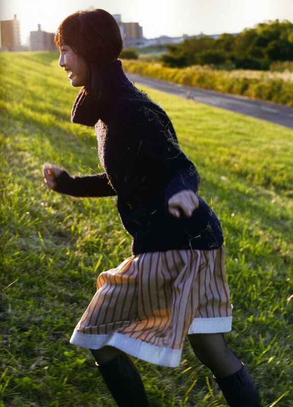 woman running in a field