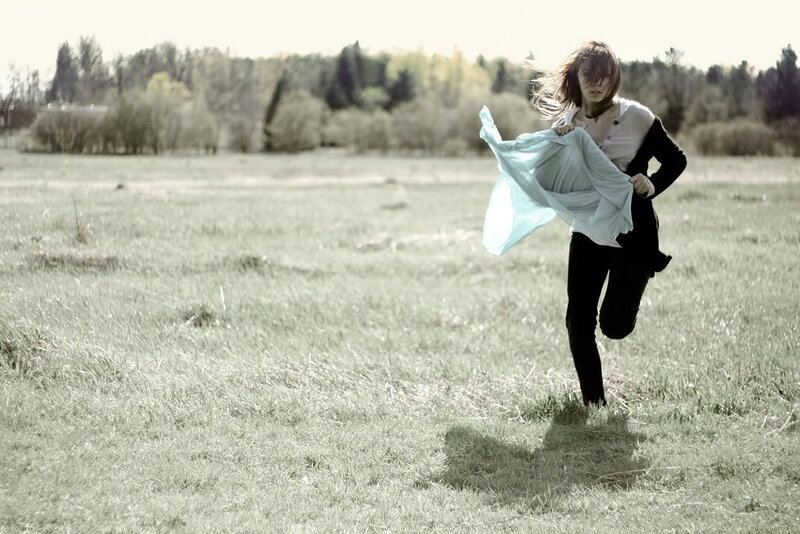 woman running in a field