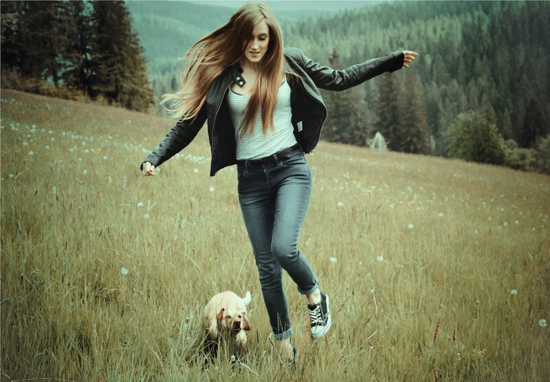 Woman running in a field