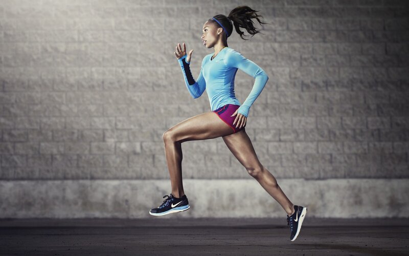 woman running in athletic wear