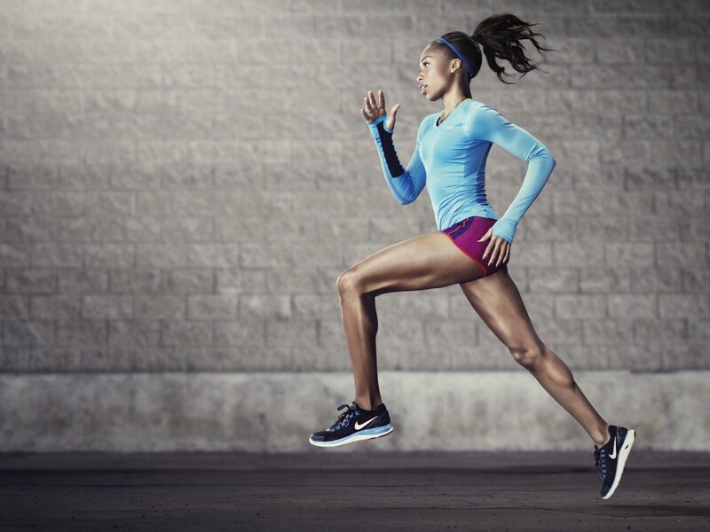 woman running in athletic wear