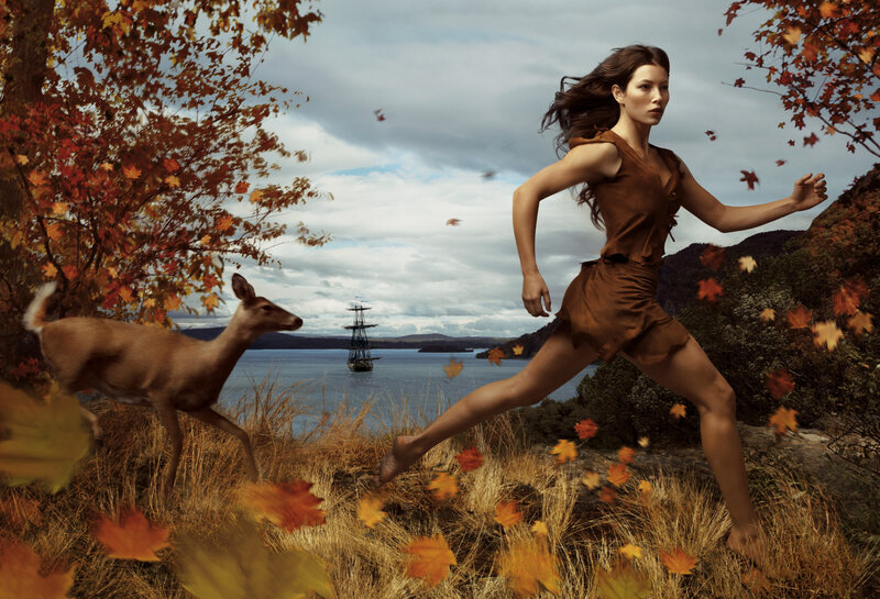 Woman running in autumn landscape
