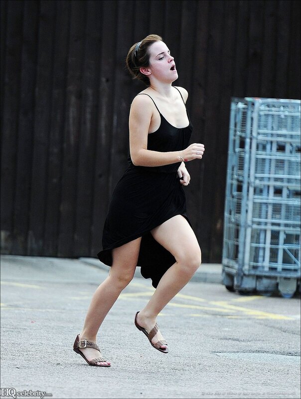 woman running in black dress