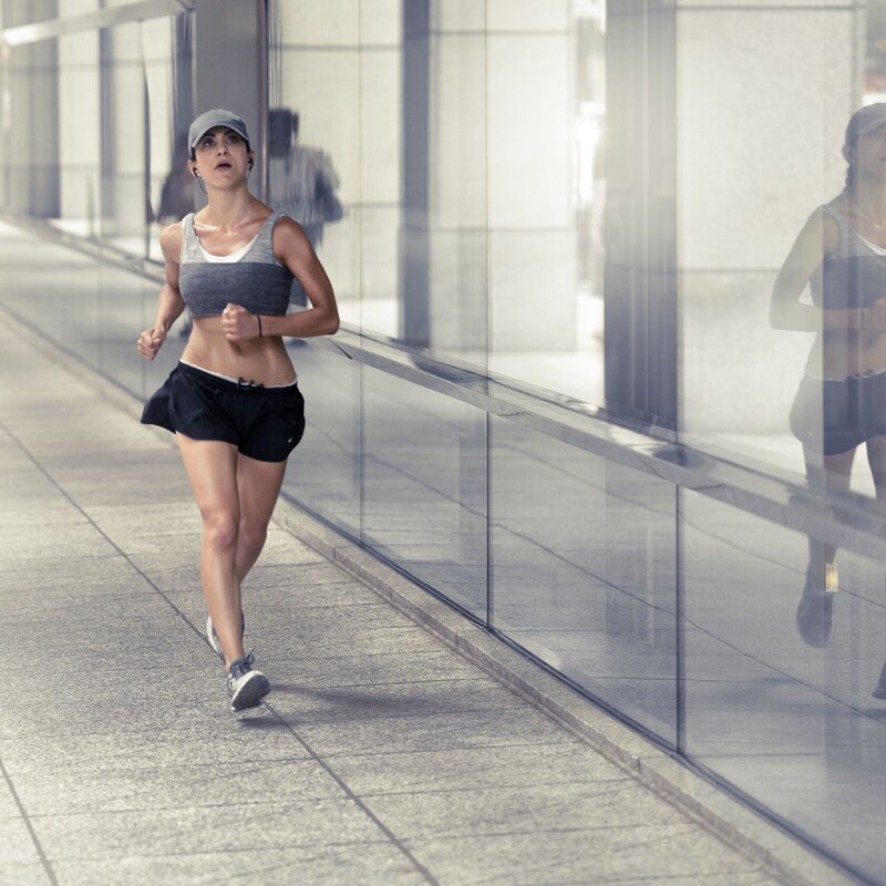 woman running in city
