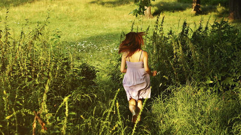 Woman Running in Field — Green