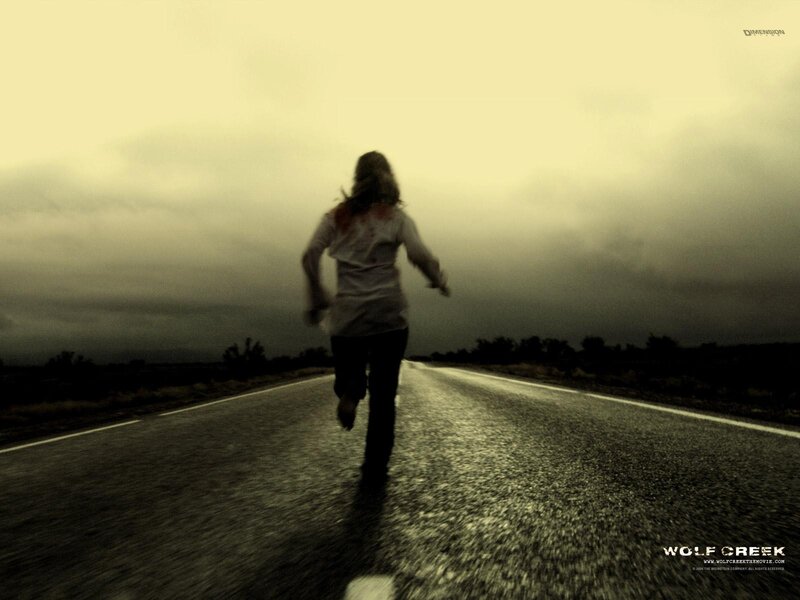 woman running on a road