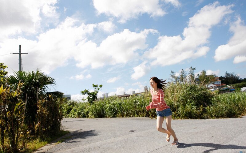 Woman running on a sunny day