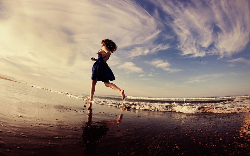 woman running on beach