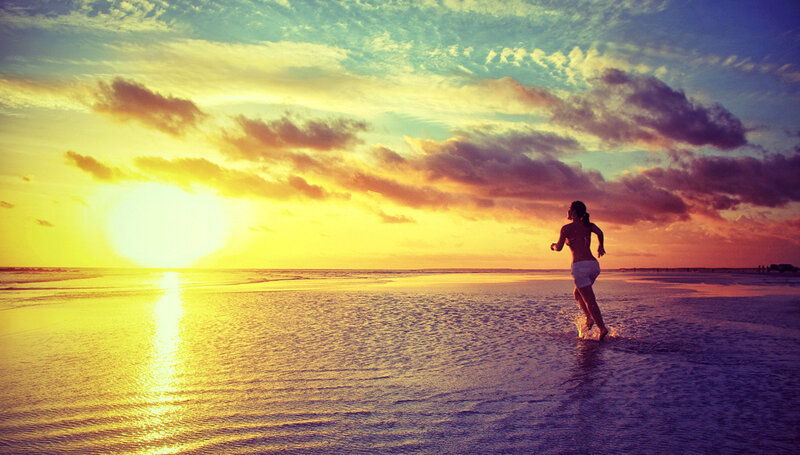 Woman Running on Beach — Yellow