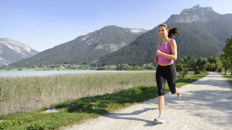 Woman Running on Path — Purple