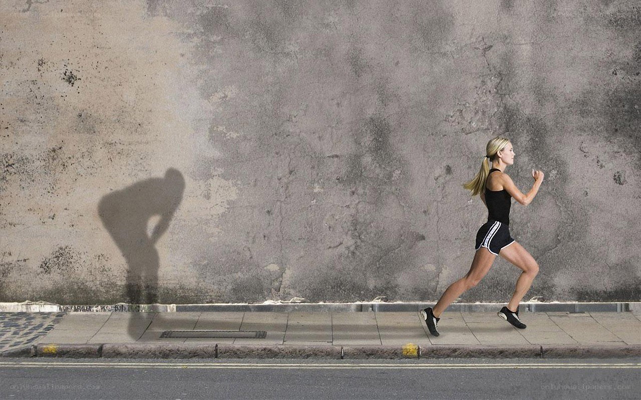 woman running on sidewalk