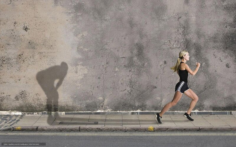 woman running on sidewalk