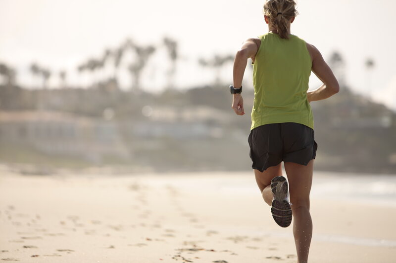 woman running on the beach