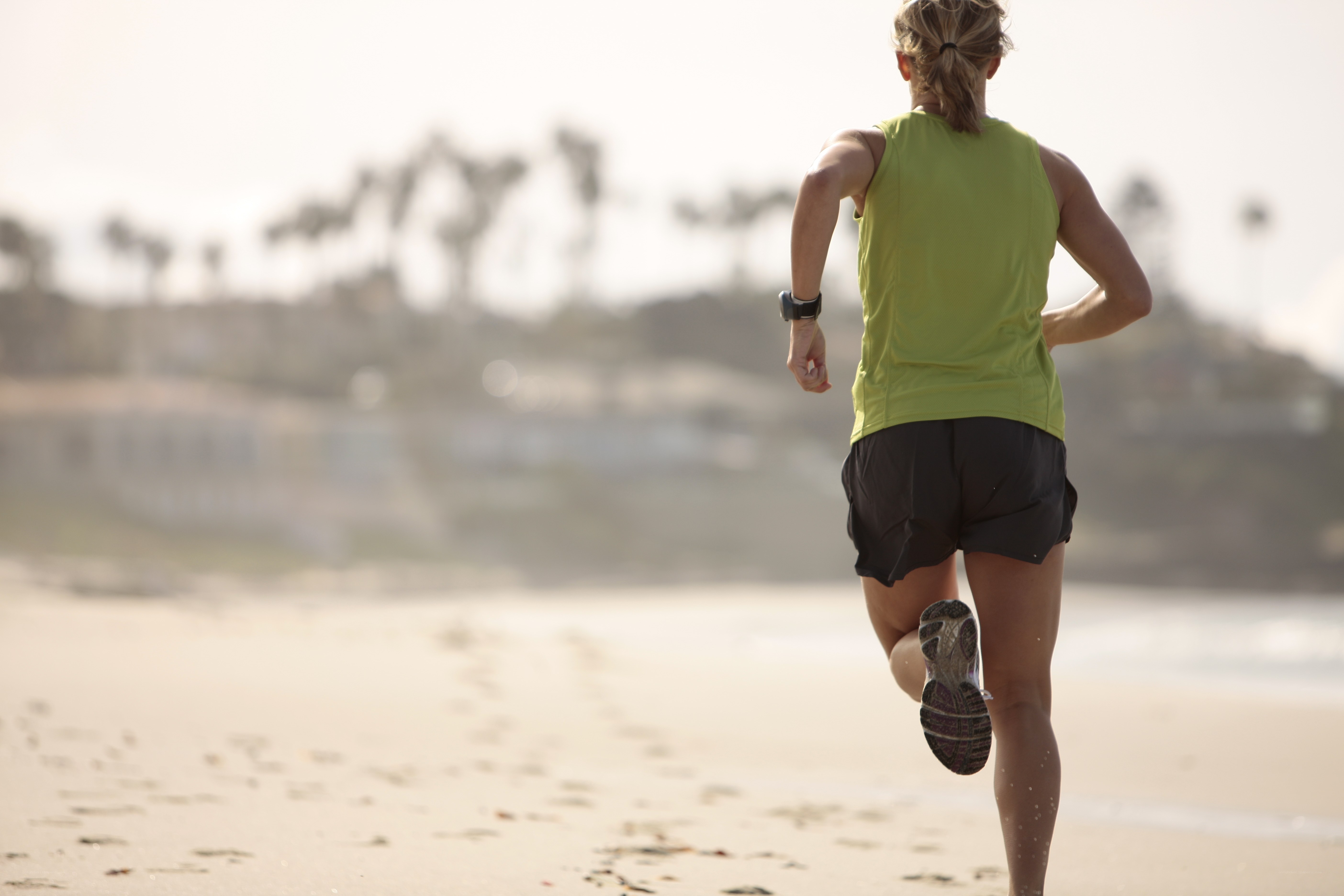 woman running on the beach